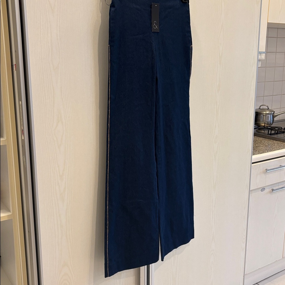 Sachin + Babi Dark Blue flare Women Jeans it is size XS. it has yellow stripes